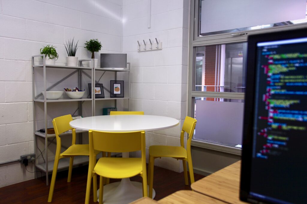 Meeting table and shelves in the Delicious Media office.