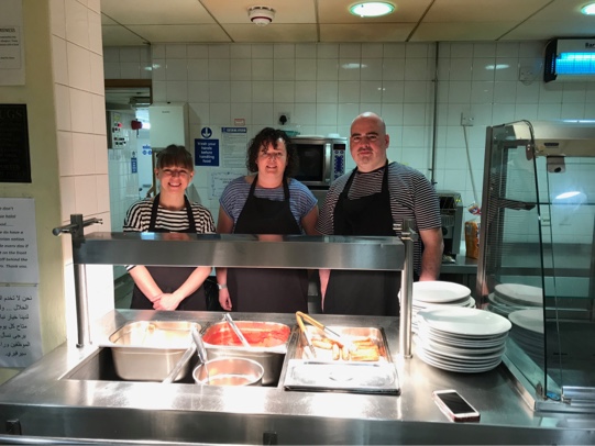 Serving breakfast at the Cathedral Archer Project